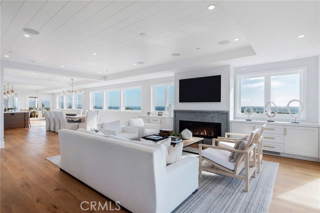 Open Floor Plan with the Living Room flowing through the Dining Room, Kitchen and into the Family Room all with Impressive Ocean Views