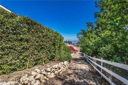 Separate gate and access road to back property. Graded professionally and ready to build.