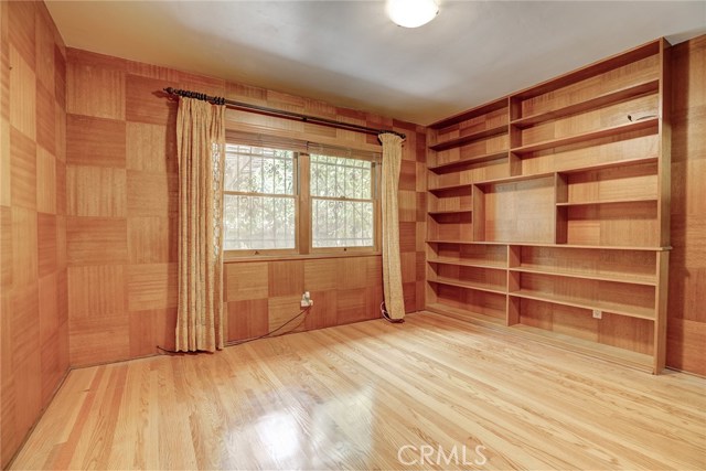 Bedroom #1 / Office. The wood paneling in this room is very high end and adds a nice elegance to the room.