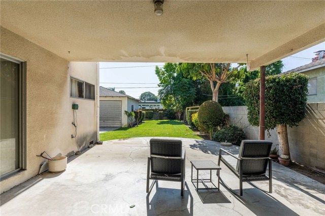 Covered patio off family room. Sliding door on left is from bedroom.