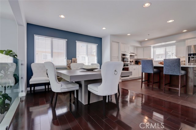 The open floor plan from the formal dining area to the kitchen make this a perfect place for family and friends to gather!