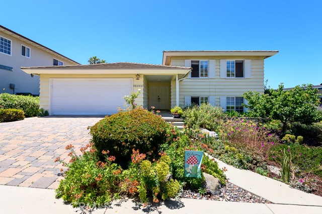 Great curb appeal with a touch of cottage style at the front façade.