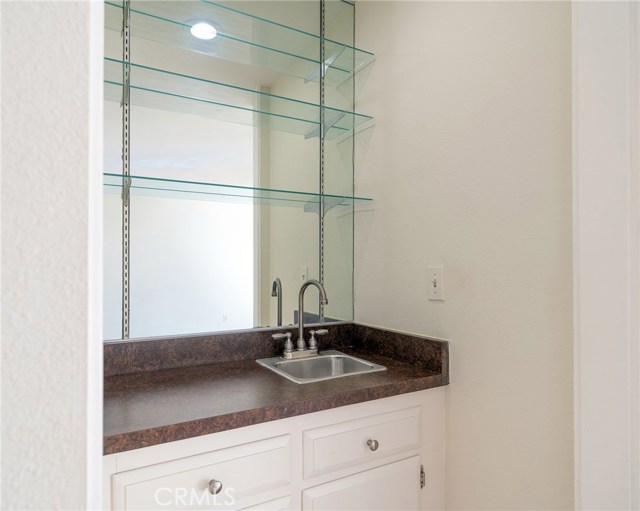 Your wet bar is set right off the main living area perfect for entertaining.