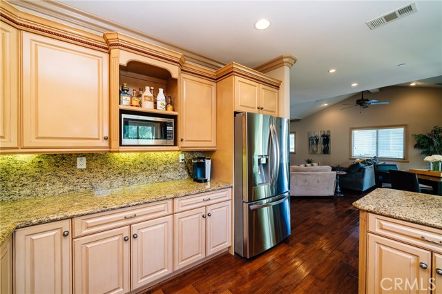 The open kitchen concept offers the living space you look for in a home.