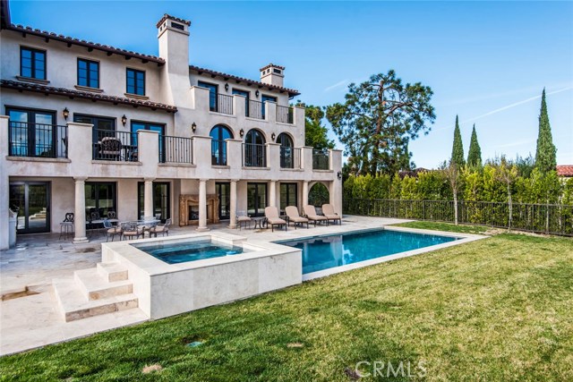 Rear yard  with pool and spa.