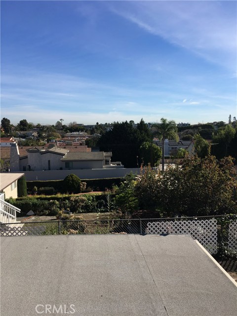 This view photo was taken from the roof of the rear rec room. Buyer's elevations may be different.