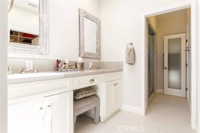 dual vanities in this handsome master bathroom dual vanities in this handsome master bathroom