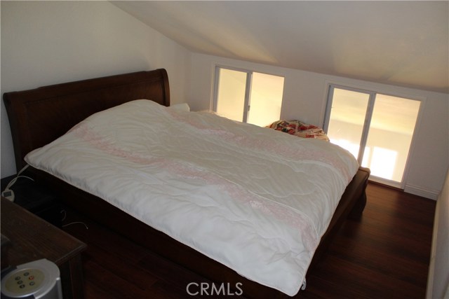 Loft type third bedroom with window.