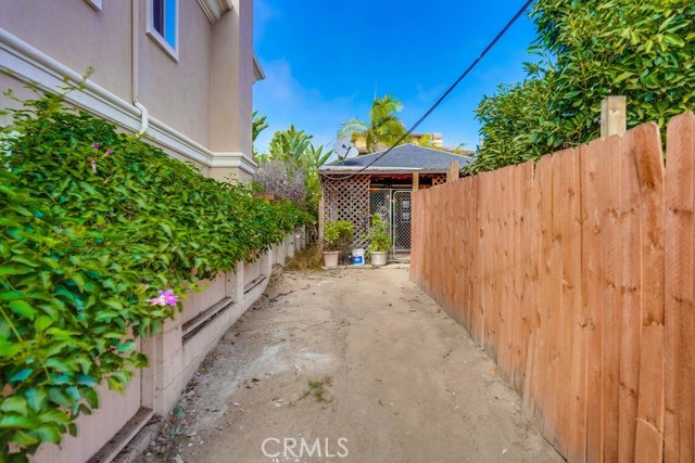 Side yard access to back house/rumpus room