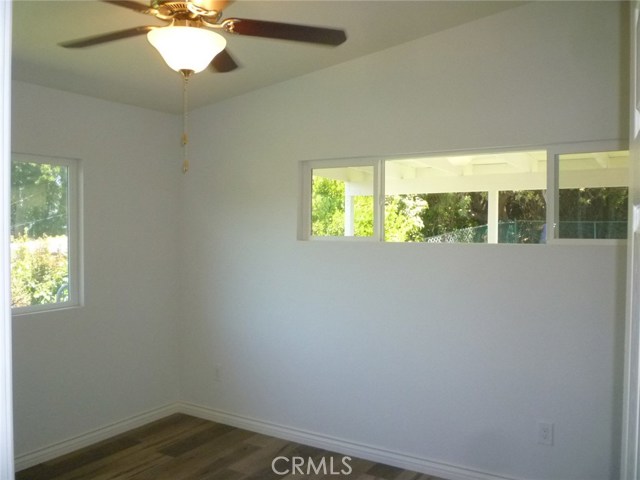 Second of three bedrooms.  This one has a harbor view and also looks towards the backyard.