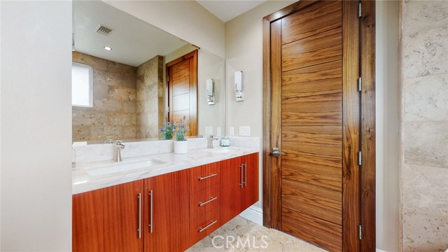 Second Master Bathroom Upstairs with Natural Quartz Counter.