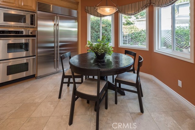 Beautiful kitchen nook overlooking newly landscaped backyard.