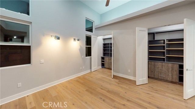 MASTER HIS AND HERS CUSTOM BUILT IN CLOSETS