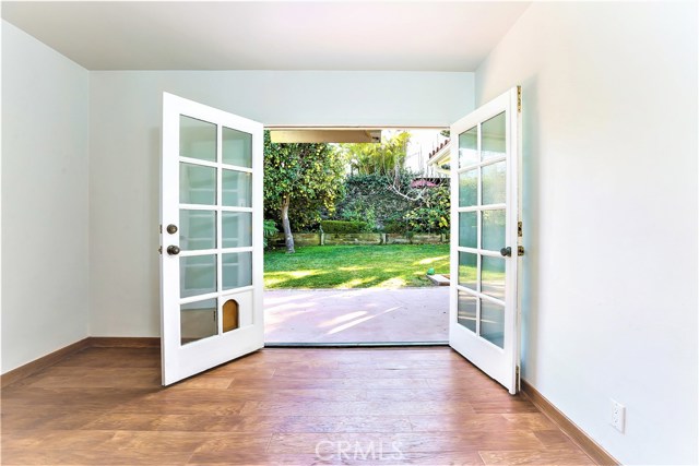 French Doors lead out from the 2nd bedroom out to the wonderful rear yard.