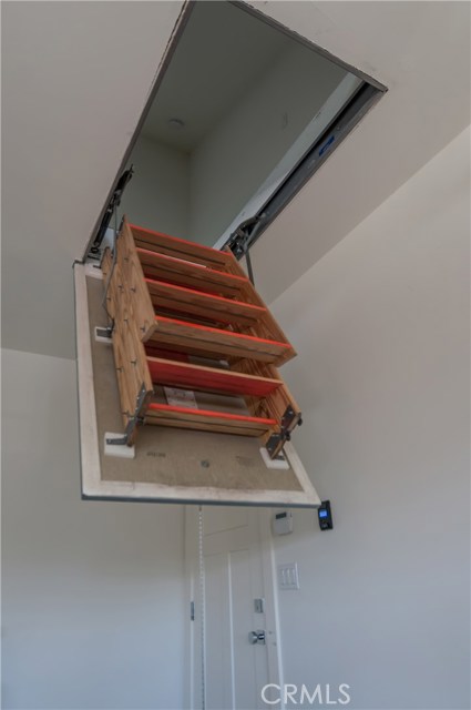 Huge finished attic/storage area above the garage.