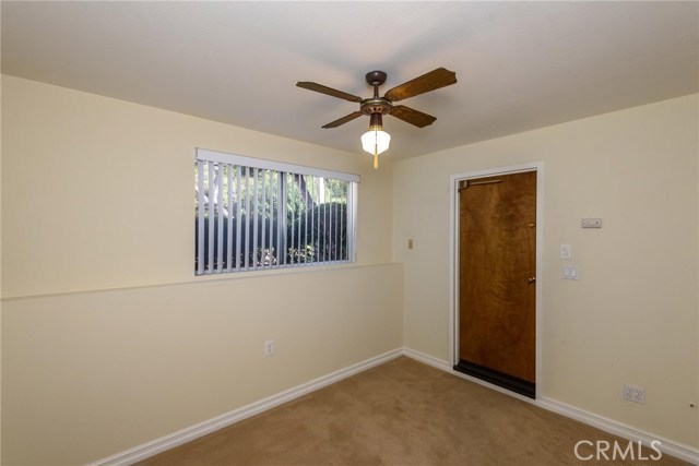 Den/bonus room by attached 2-car garage.