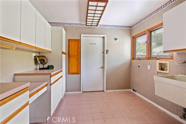 Butler's Pantry/Laundry room with direct access to garage.