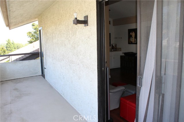 private walkway or balcony outside the den