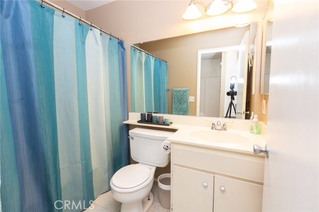 Hallway bathroom with tub