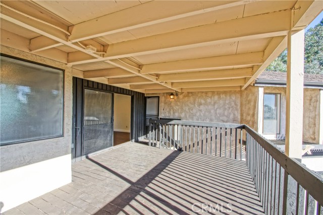 Balcony off the main entrance/den. From this balcony you can see the entire yard.