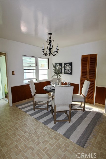 Dining area in this family style kitchen. Back door leads out to the patio, backyard and garage.