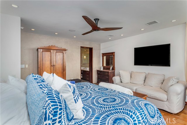 Master bedroom leading into master bathroom