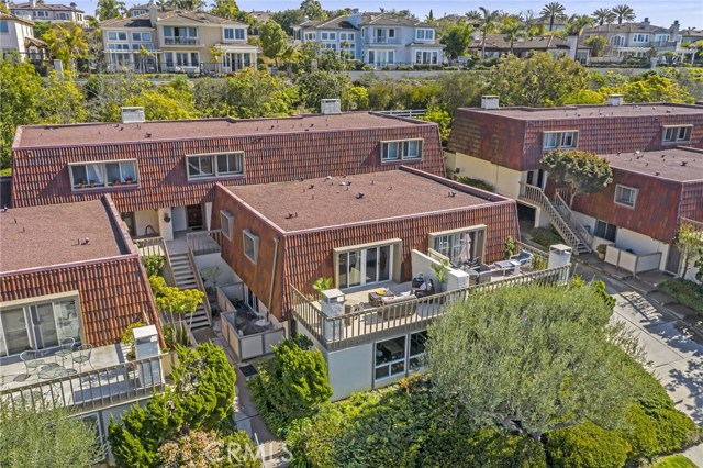 Overhead of front of property, downstairs patio and upstairs deck