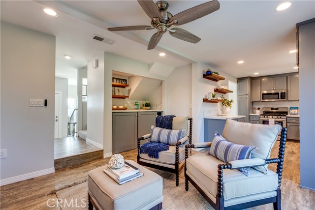 Connected to the kitchen is separate family room with a fireplace, and laundry station with w/d cabinets