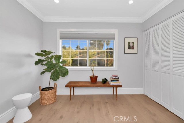 This  room catches the morning sun... wide planked oak flooring makes this home feel warm and inviting