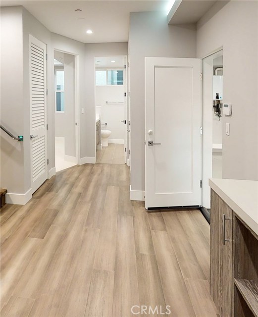 ENTRY FROM FRONT DOOR AND ACCESS TO GARAGE