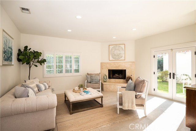 Family room opens to south-facing backyard