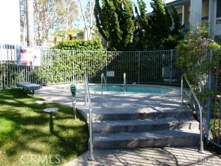 Spa with privacy hedging and landscaping