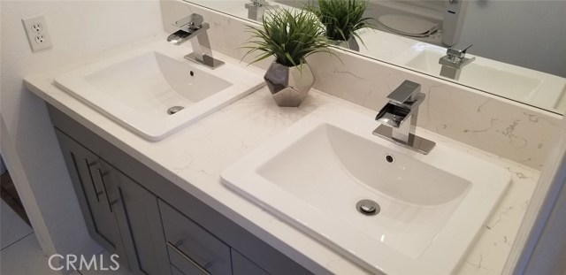 Completely upgraded bathroom with quartz counter tops,new sinks and fixtures.