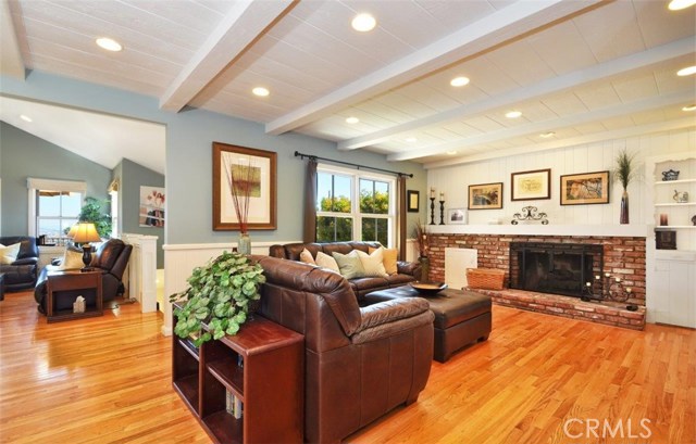 Living Room is now a modern families Great Room - open to both Dining and the Family Room. This Entry Level is encircled with Harbor and City light Views.