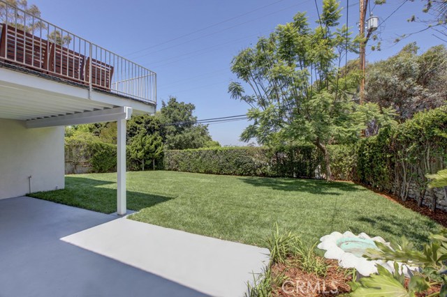 Covered Patio, Adjoins Lower Level Family Room and Bedroom