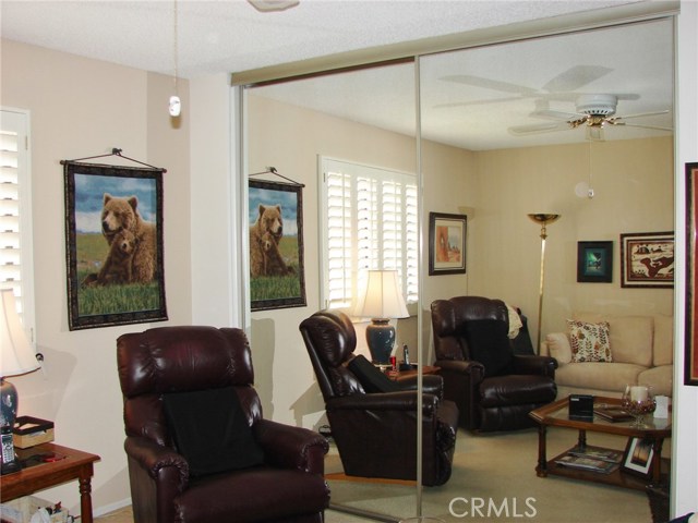 ANOTHER VIEW INSIDE THE FRONT GUEST BEDROOM. FULL MIRRORED WALL CLOSET.