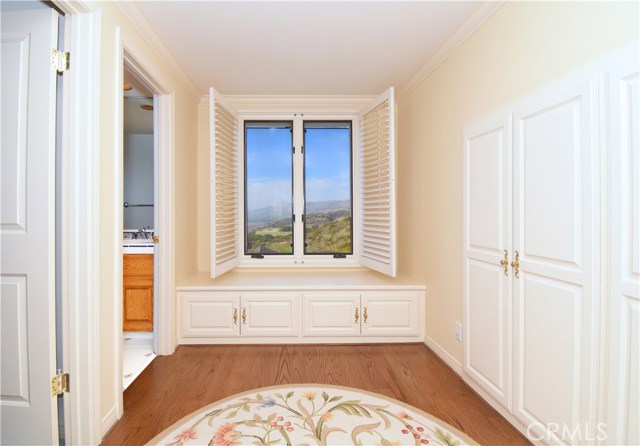 Upstairs bench seating soaks up pastoral and ocean views. Abundant storage in hall.