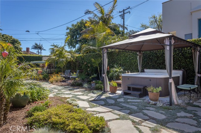 Backyard with hot tub spa.
