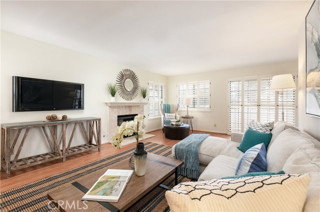 Living Room with Fireplace and Balcony