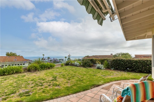 Sit down and enjoy the backyard view.