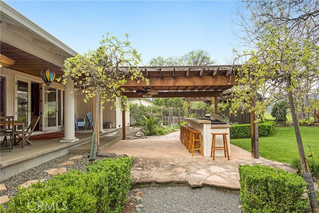 Covered outdoor trellis & kitchen