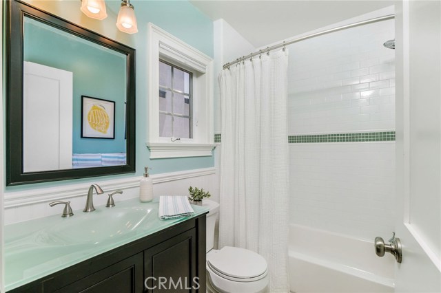 Bedroom one of four upstairs has this en suite full bathroom.
