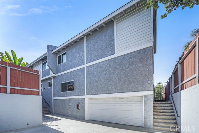 2 Car Garage on End Unit, also shows one of the two, first come, first serve, Guest Parking spaces.