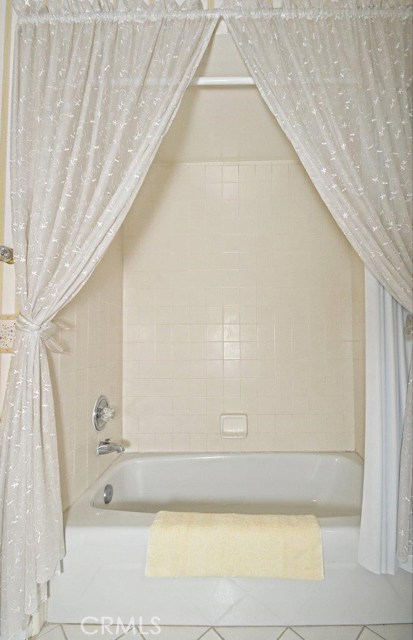 Upstairs bathroom combo shower/tub.