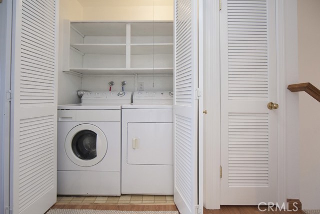 Upper level laundry area.