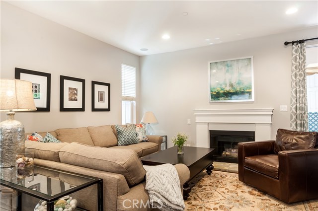 Living area includes a cozy gas fireplace.