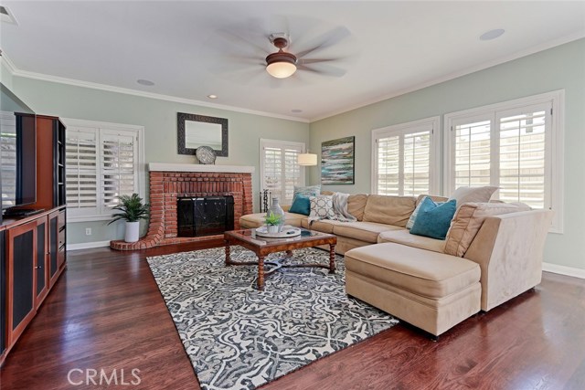 Family Room Area with Brick Fireplace