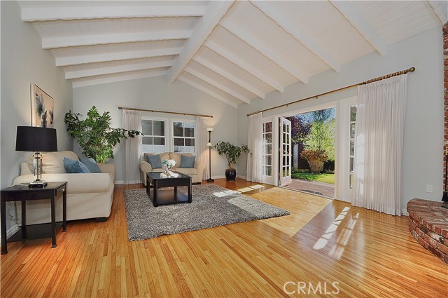 Large Living Room with Cathedral Wood-Beamed Ceiling