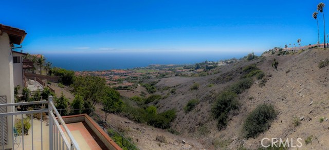 View from the living room balcony. Kitchen, dining room and living room all share great natural light and views of the Pacific coastline! Expansive panoramic views are waiting for you!