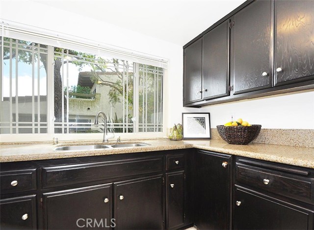 Kitchen with Large Windows Looking Out